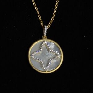Freida Rothman mother of pearl and rhinestone star design, circle disk necklace.